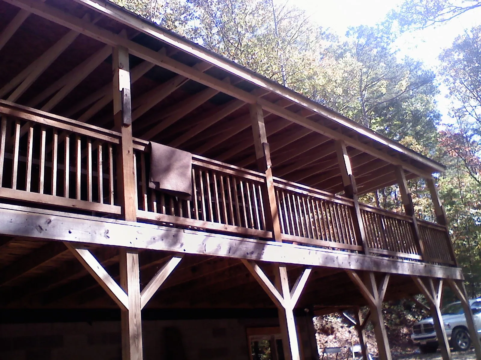 Timber framing under a new elevated porch and deck — Roof Leak Repair in Thomasboro by Roofing Brothers
